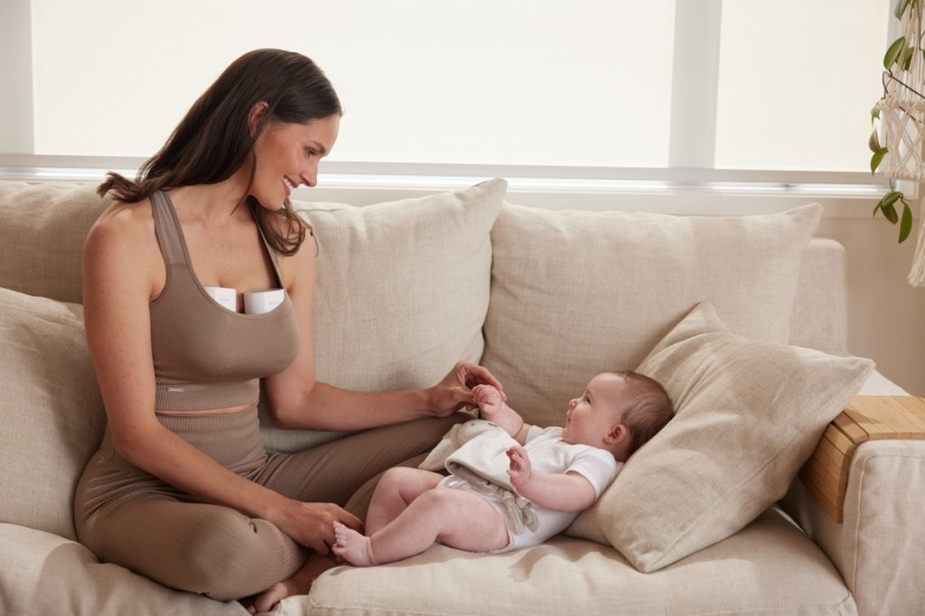 Mother Wearing Mom Cozy Pump while Playing with Baby