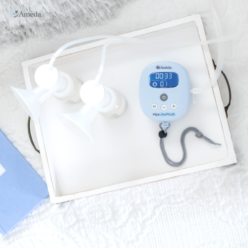 Ameda Mya breast pump on a tray